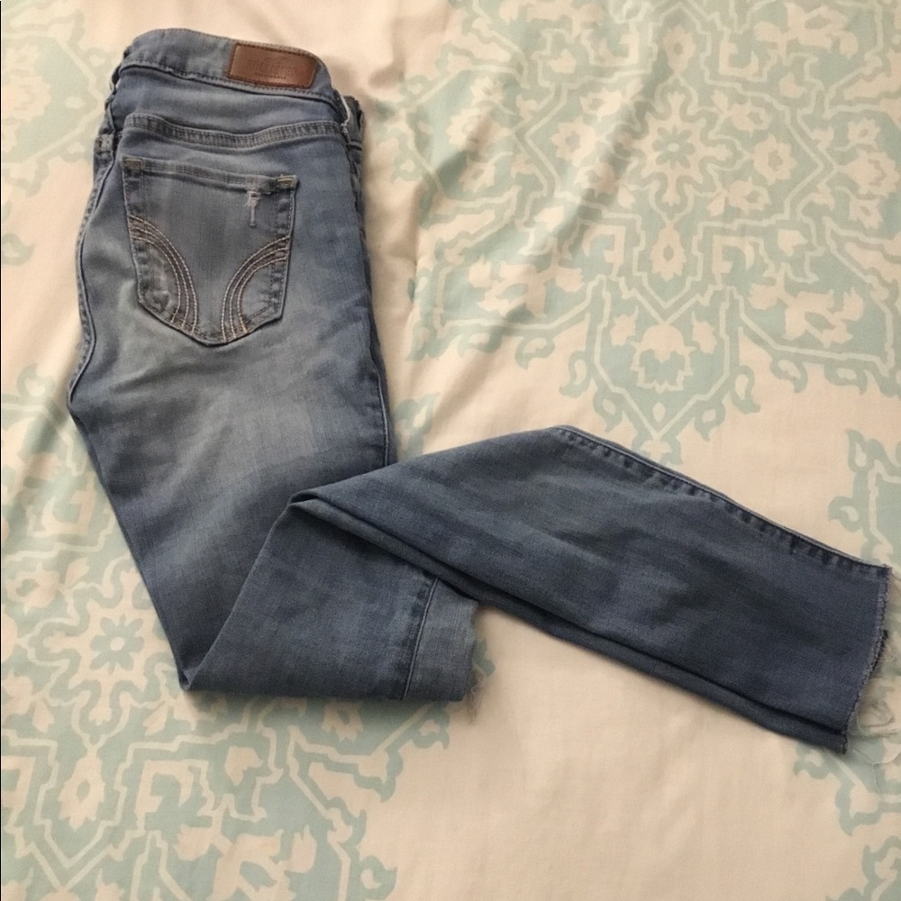 Hollister low rise jeans with a few rips .